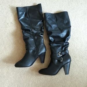 Knee high boots with buckle accents